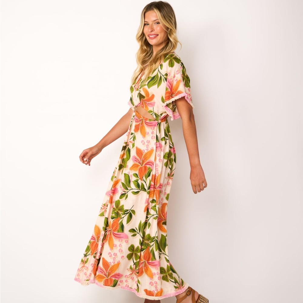 Z&L Floral Maxi dress with peak a boo waistline.